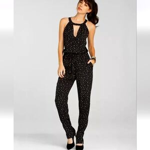 BCBGeneration Jumpsuit Black with Stars Print Cutouts Straight Leg XXS / XS